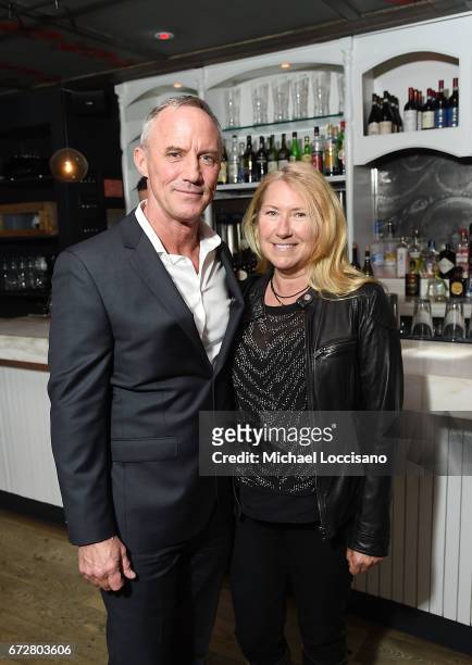 Actor Robert John Burke and wife attend a cocktail party at Bocca di Bacco Chelsea before the HBO Documentary screening of "I Am Evidence" on April...