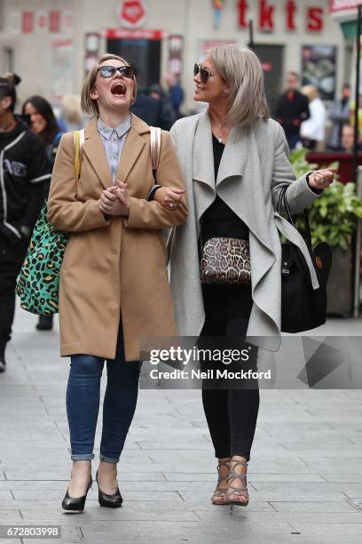 Claire Richards and Faye Tozer from Steps seen leaving the Global Radio Studios on April 25, 2017 in London, England.