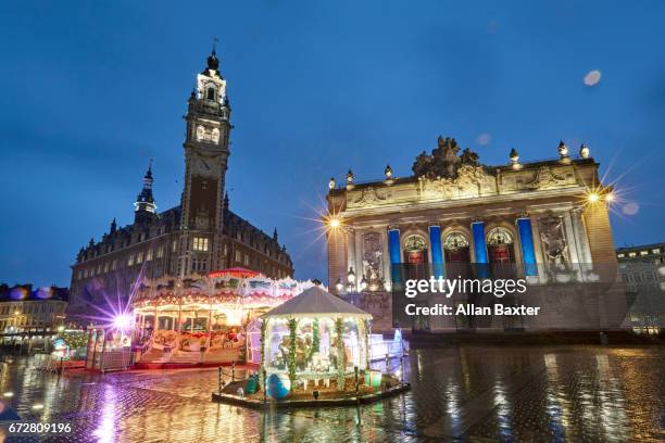opera house in lille illuminated at dusk during christmas - lille france stock pictures, royalty-free photos & images