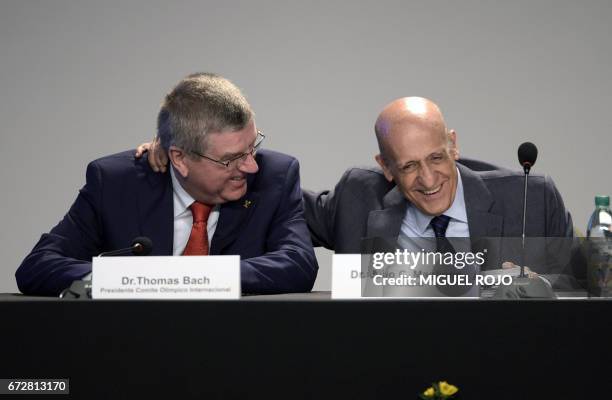 President Thomas Bach and ODEPA ´resident Julio Cesar Maglione speak during the LIV ODEPA Ordinary Assembly on April 25, 2017 in Punta del Este, 140...