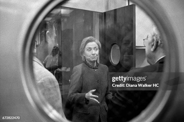 First Lady Hillary Rodham Clinton talks to staff about plans for upcoming guests to the White House in the pantry of the State Dining Room on October...