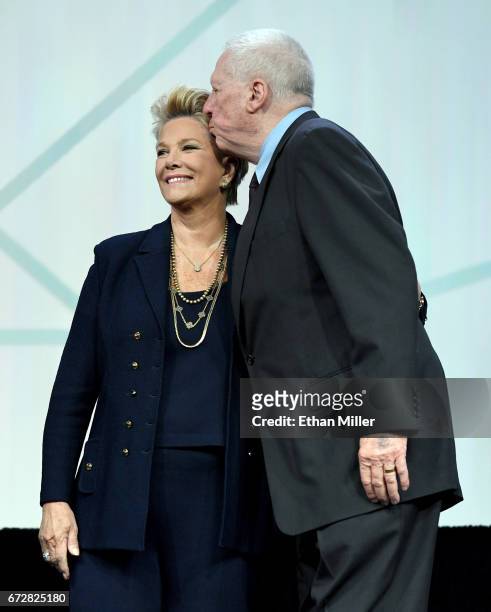 Journalist and media host David Hartman kisses his former "Good Morning America" co-host, journalist and television host Joan Lunden, after they...
