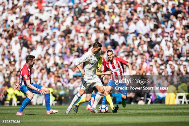 Cristiano Ronaldo of Real Madrid in action during their La Liga match between Real Madrid and Atletico de Madrid at the Santiago Bernabeu Stadium on...