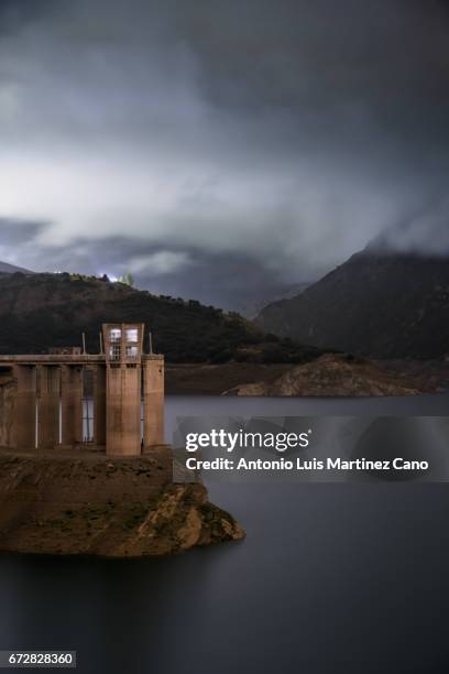 tower in reservoir lake, granada, spain - gloomy swamp stock pictures, royalty-free photos & images