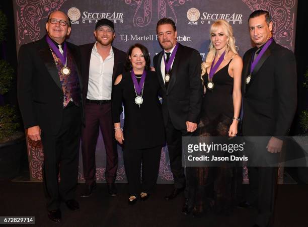 Committee Co-Chair John Esposito, Cole Swindell, Committee Co-Chairmen Eliza Kraft Olander and Rob Beckham, and Wine Host and Presenting Sponsor John...