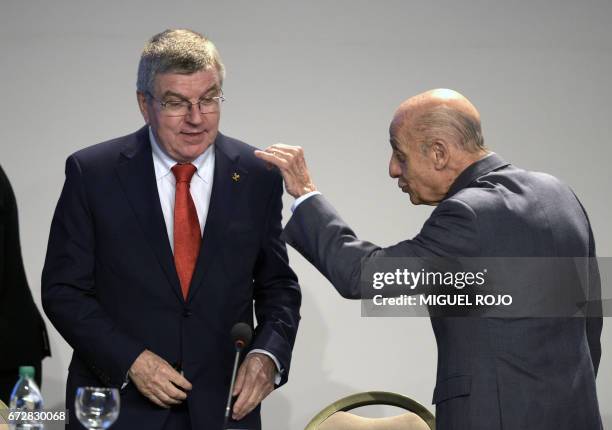 President Thomas Bach and ODEPA ´resident Julio Cesar Maglione speak during the LIV ODEPA Ordinary Assembly on April 25, 2017 in Punta del Este, 140...