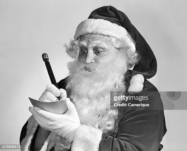 1950s SANTA CLAUS WRITING NAUGHTY AND NICE LIST