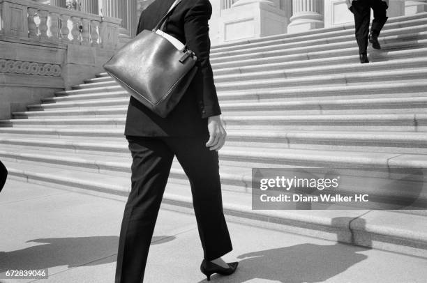 Senator Hillary Rodham Clinton is photographed walking up the steps of the US Capitol to meet with Senate leaders on May 16, 2006 in Washington, DC....