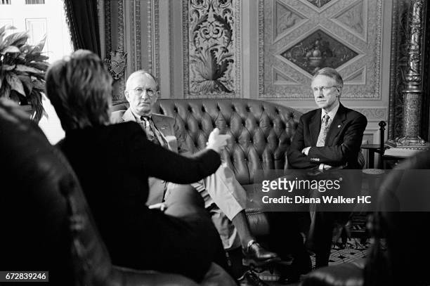 Senators Hillary Rodham Clinton, James M. Jeffords and Harry Reid are photographed discussing work of the Environment and Public Work committee on...