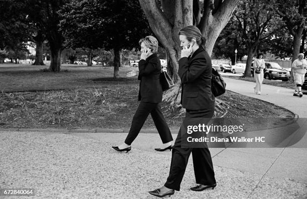 Senator Hillary Rodham Clinton and her deputy communications director, Sarah Gegenheimer, walk between the Capitol and her office in the Russell...