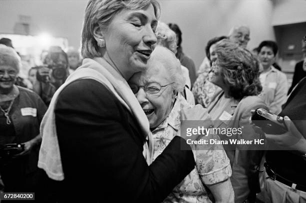 Senator Hillary Rodham Clinton is photographed after she speaks at a community forum consoling a constituent on July 28, 2001 in Horseheads, New...