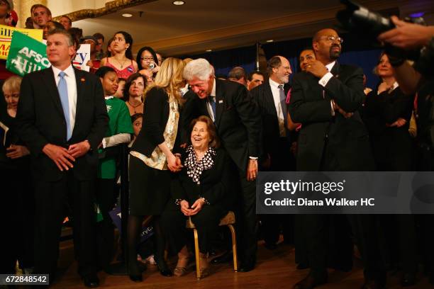 Former President William Clinton, daughter Chelsea Clinton and mother-in-law Dorothy Rodham are photographed looking on as Senator Hillary Rodham...