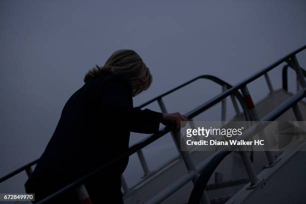 Secretary of State Hillary Rodham Clinton reruns to her plane to depart for Pakistan on October 20, 2011 in Kabul, Afghanistan. CREDIT MUST READ:...