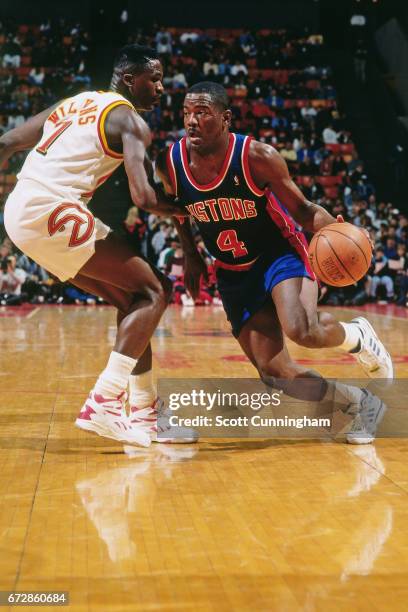 Joe Dumars of the Detroit Pistons drives against the Atlanta Hawks during a game played circa 1990 at the Omni in Atlanta, Georgia. NOTE TO USER:...