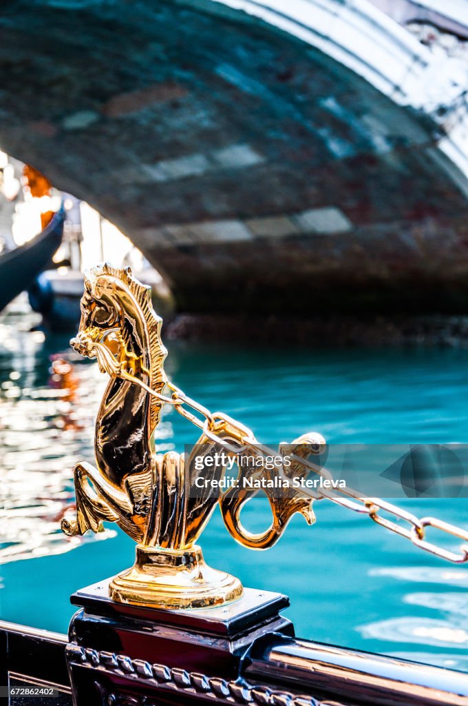 Unusual symbol of Venice. Seahorse decoration on a Venetian gondola, Venice, Italy.