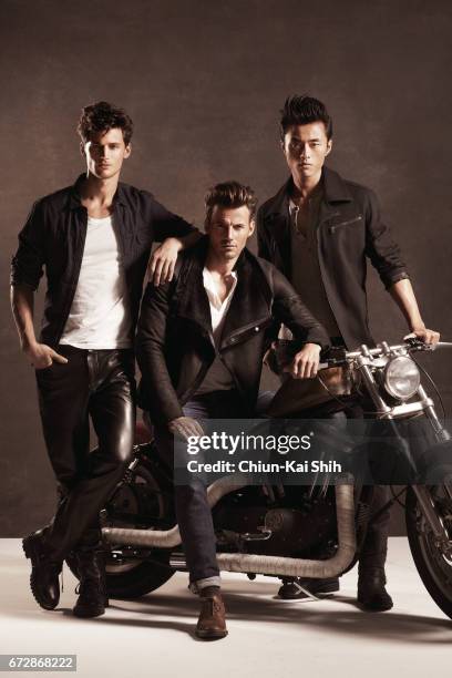 Models Garrett Neff, Alex Lundqvist and Zhao Lei are photographed for August Man on August 7, 2002 in New York City. COVER IMAGE.