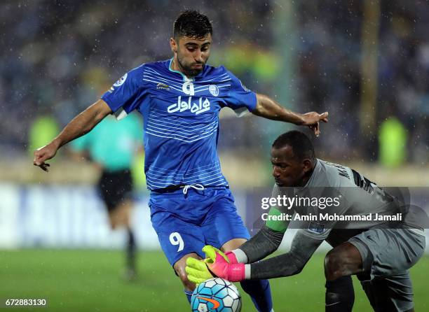 Kaveh Rezaei of Esteghlal and Majed Naser of Al Ahli in action during AFC Champions League match between Esteghlal vs Al Ahli FC at Azadi Stadium on...