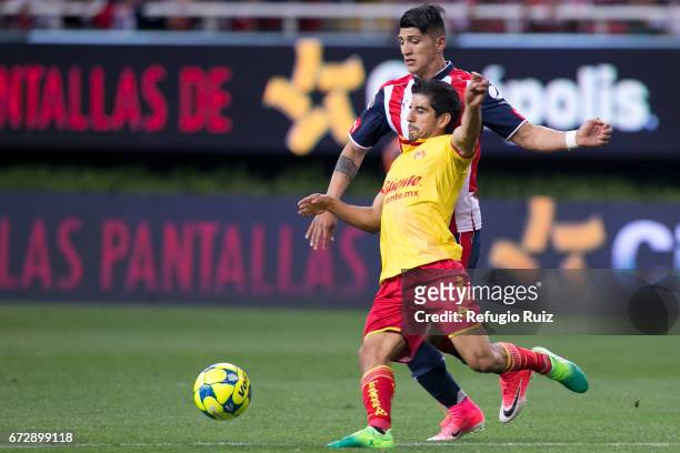 Alan Pulido of Chivas fights for the ball with Diego Valdes of Morelia during the Final match between Chivas and Morelia as part of the Copa MX...