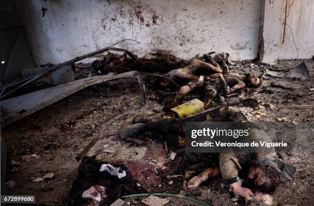 Dead bodies of ISIS fighters killed by a rocket.