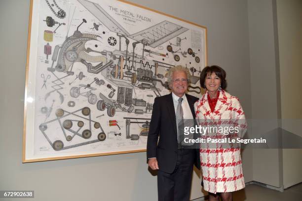 Laurent Dassault and his wife Martine attend "Art Afrique, Le Nouvel Atelier" Exhibition Opening at Fondation Louis Vuitton on April 25, 2017 in...