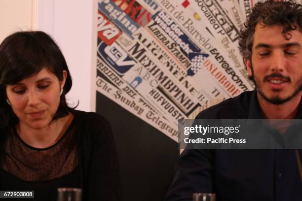 Italian reporter and documentary filmmaker specializing in migrant issues Gabriele Del Grande speaks next to his wife Alexandra D'Onofrio, during a...