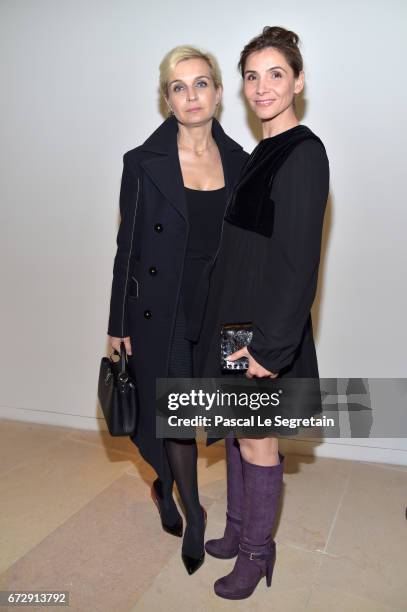 Melita Toscan du Plantier and Clotilde Courau attend "Art Afrique, Le Nouvel Atelier" Exhibition Opening at Fondation Louis Vuitton on April 25, 2017...