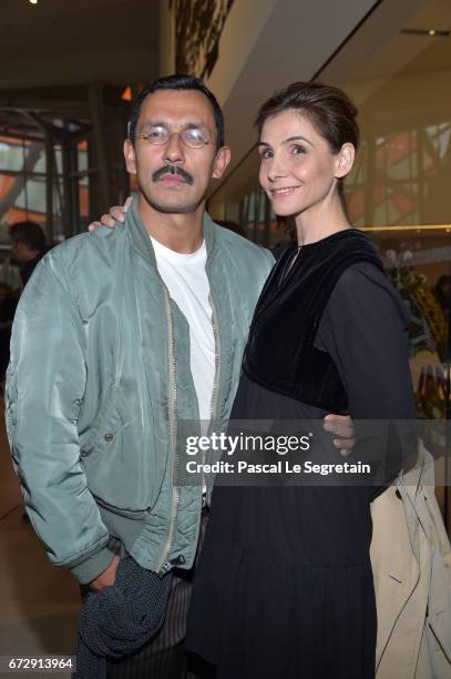 Fashion Designer Haider Ackermann and Clotilde Courau attend "Art Afrique, Le Nouvel Atelier" Exhibition Opening at Fondation Louis Vuitton on April...