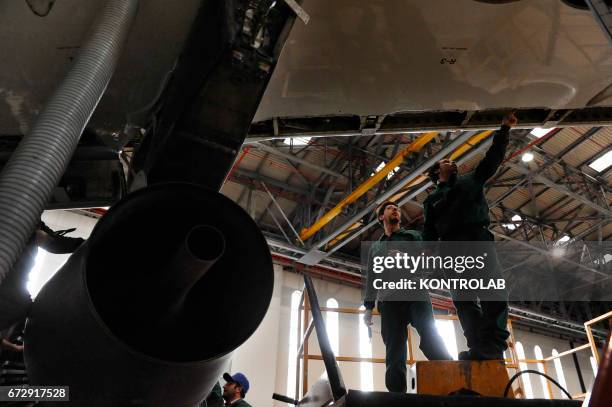 Atitech workers, work on Alitalia airplane in Atitech Factory, in the airport of Capodichino in Naples.