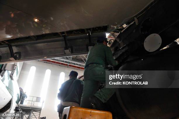 Atitech workers, work on Alitalia airplane in Atitech Factory, in the airport of Capodichino in Naples.