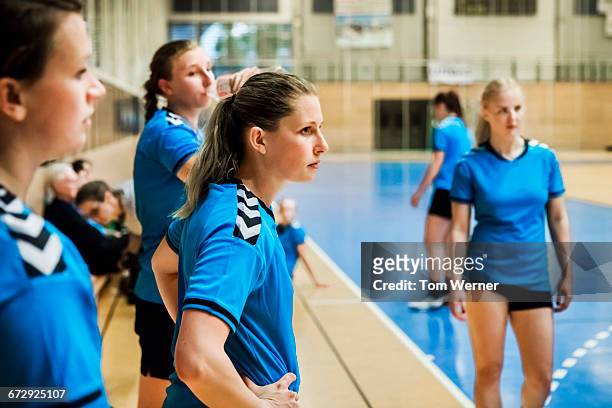 female handball players during training session - handball girl stock pictures, royalty-free photos & images