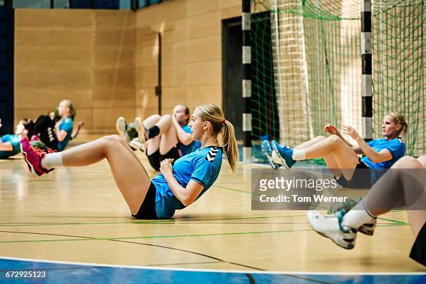 female handball team training - handball girl stock pictures, royalty-free photos & images