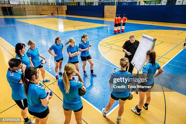 handball team briefing - handball girl stock pictures, royalty-free photos & images