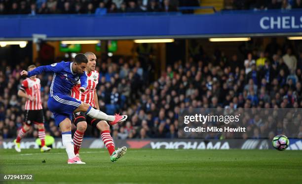 Eden Hazard of Chelsea scores their first goal during the Premier League match between Chelsea and Southampton at Stamford Bridge on April 25, 2017...