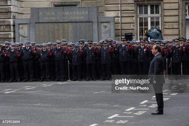 French President Francois Hollande attends the National tribute to fallen French Policeman Xavier Jugele on April 25, 2017 in Paris, France. French...