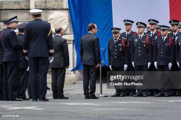 French President Francois Hollande attends the National tribute to fallen French Policeman Xavier Jugele on April 25, 2017 in Paris, France. French...