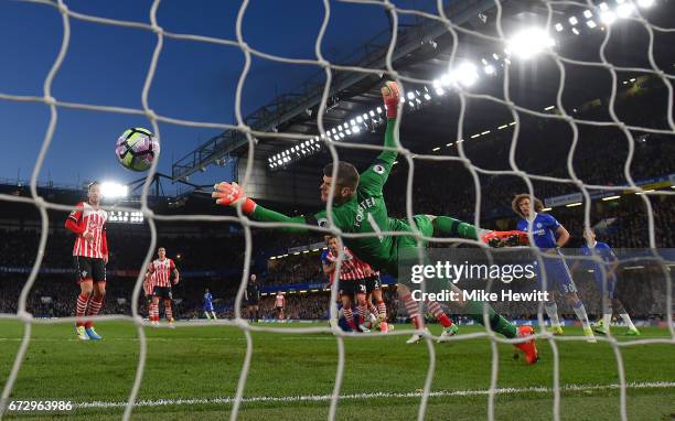 Fraser Forster of Southampton fails to stop Gary Cahill of Chelsea from scoring their second goal during the Premier League match between Chelsea and...