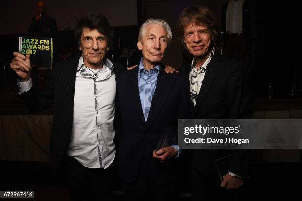 Ronnie Wood, Charlie Watts and Mick Jagger of The Rolling Stones accept the award for Album Of The Year: Public Vote for their album 'Blue &...