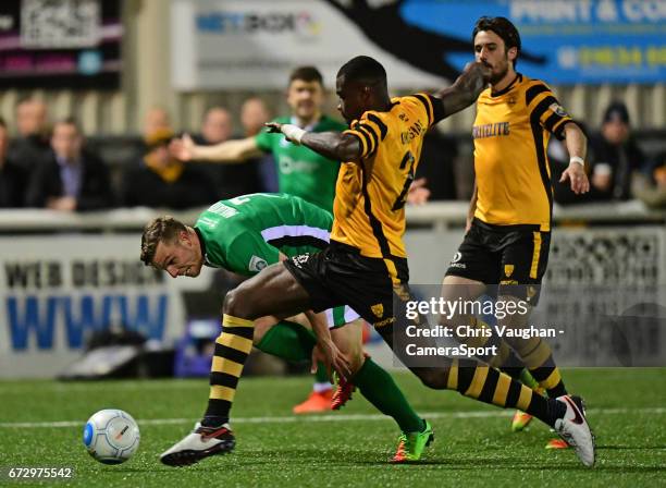 Lincoln City's Jack Muldoon vies for possession with Maidstone United's Magnus Okuonghae during the Vanarama National League match between Maidstone...