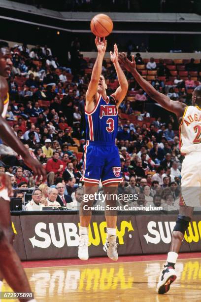 Drazen Petrovic of the New Jersey Nets shoots against the Atlanta Hawks during a game played circa 1990 at the Omni in Atlanta, Georgia. NOTE TO...