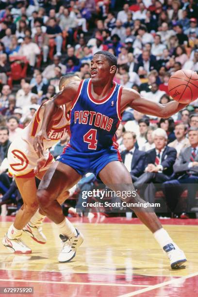 Joe Dumars of the Detroit Pistons drives against the Atlanta Hawks during a game played circa 1990 at the Omni in Atlanta, Georgia. NOTE TO USER:...