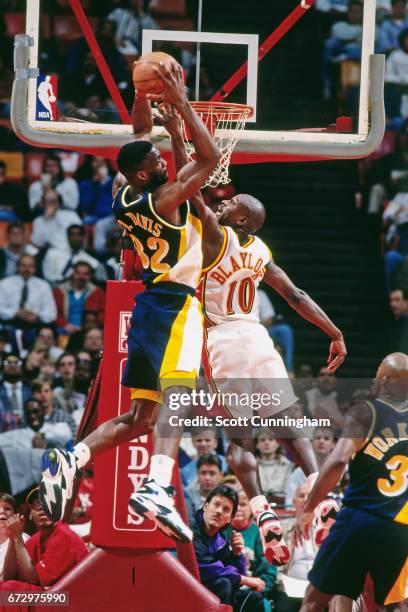 Antonio Davis of the Indiana Pacers rebounds against the Atlanta Hawks during a game played circa 1990 at the Omni in Atlanta, Georgia. NOTE TO USER:...