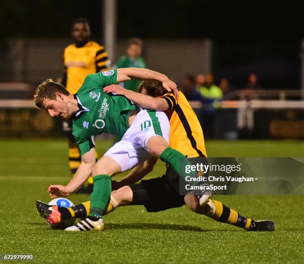 Lincoln City's Adam Marriott vies for possession with Maidstone United's Stuart Lewis during the Vanarama National League match between Maidstone...