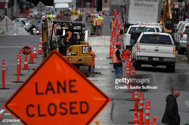 Construction crews conduct repairs on Broadway Street on April 25, 2017 in San Francisco, California. According to a analysis brief commissioned by...