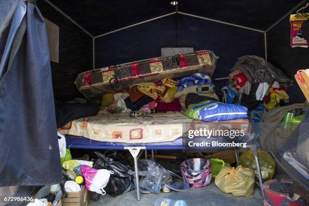 Personal items are seen inside a tent at a temporary housing camp near the destroyed town of Barba Blanca, Huarochiri Province, in Lima, Peru, on...
