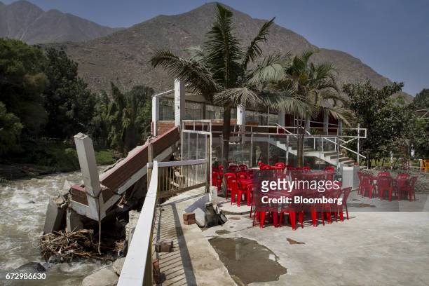 Restaurant destroyed by massive floods stands in the district of Santa Eulalia, Huarochiri Province, in Lima, Peru, on Saturday, April 22, 2017....