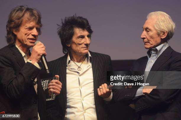Mick Jagger, Ronnie Wood and Charlie Watts of The Rolling Stones accept the award for Album Of The Year: Public Vote for their album 'Blue &...