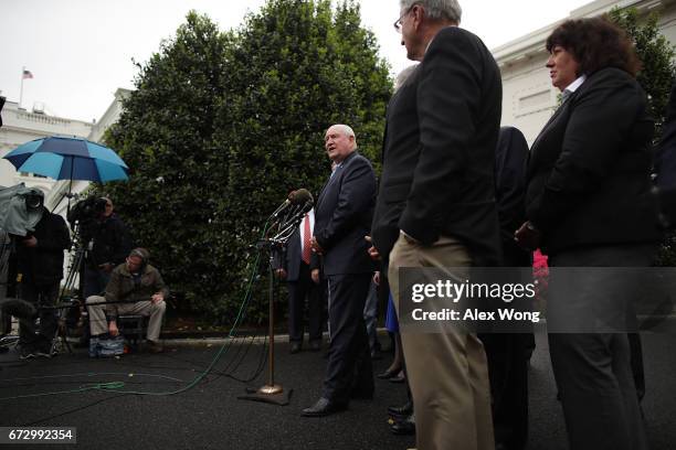 Agriculture Secretary Sonny Perdue speaks to members of the media outside the West Wing of the White House after a Roosevelt Room event April 25,...