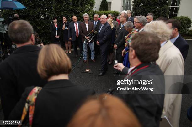 Agriculture Secretary Sonny Perdue speaks to members of the media outside the West Wing of the White House after a Roosevelt Room event April 25,...