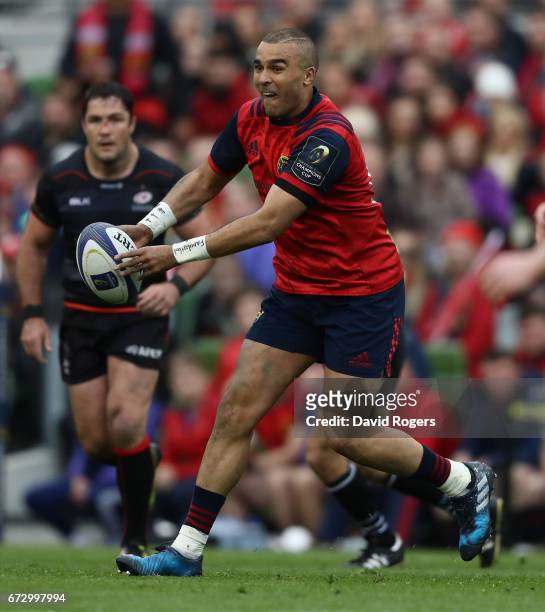 Simon Zebo of Munster passes the ball during the European Rugby Champions Cup semi final match between Munster and Saracens at the Aviva Stadium on...