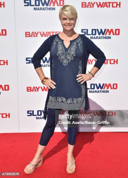 Actress Erika Eleniak arrives at the 'Baywatch' SlowMo Marathon at Microsoft Square on April 22, 2017 in Los Angeles, California.
